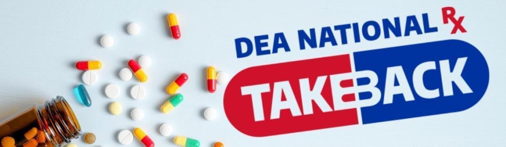 spilled bottle of pills next to the DEA National RX TakeBack logo